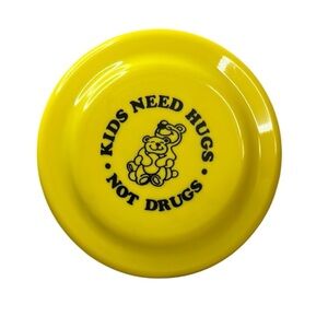 Yellow Kids Need Hugs Not Drugs frisbee VINTAGE